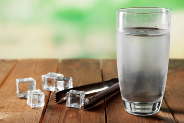 Glass of water with ice