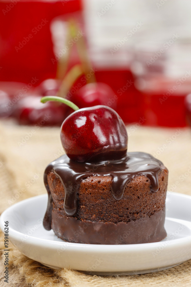 Sticker chocolate cake with cherries