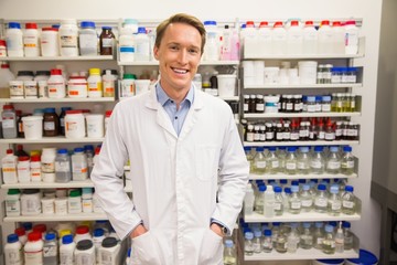 Handsome pharmacist smiling at camera