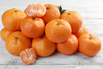 Tangerines on wooden background