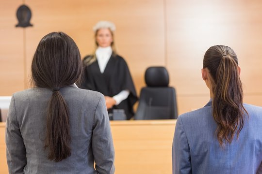 Lawyers listening to the judge