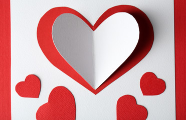 Beautiful hand made post card  with paper hearts, close-up