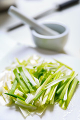 A close up image of chopped spring onions