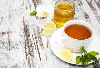 Cup of tea with lemon and honey
