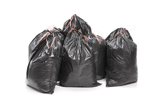 Bunch of garbage bags isolated on white background