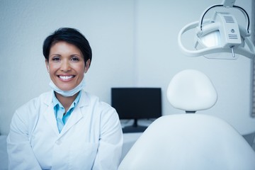 Smiling young female dentist