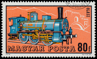 Fototapeta na wymiar Stamp printed in Hungary shows italian locomotive