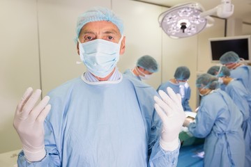 Fototapeta na wymiar Medical students practicing surgery on model