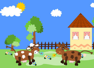 Obraz na płótnie Canvas Cows grazing on a green meadow