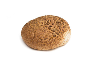 Round brown bread. Photo.