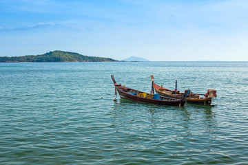 Fototapeta na wymiar Traditional Thai boats in the Andaman Sea