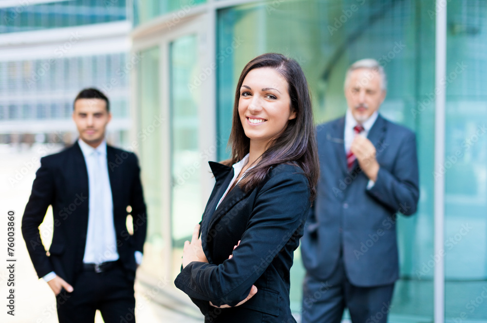 Canvas Prints Businesswoman in front of a group of business people