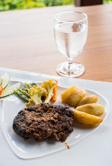 Shot of Beef steak set on the white table.