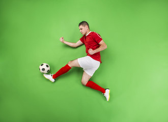 Fototapeta na wymiar Football player in action