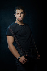 Obraz premium Handsome guy looking at camera, studio shot