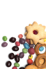 Tea time. Cookies with colored candies. Photo.