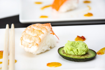 sushi and wasabi with soy sauce