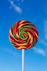 Colorful lollipop with blue sky background