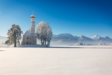 St. Coloman at a sunny winter day, Allgäu, Germany