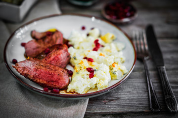 Grilled steak with cauliflower and pomegranate