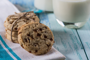 Stack of homemade cookies and organic fresh milk