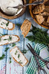 fresh dill with soft white cheese and wholegrain bread