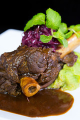 Lamb shank braised in an onion jus