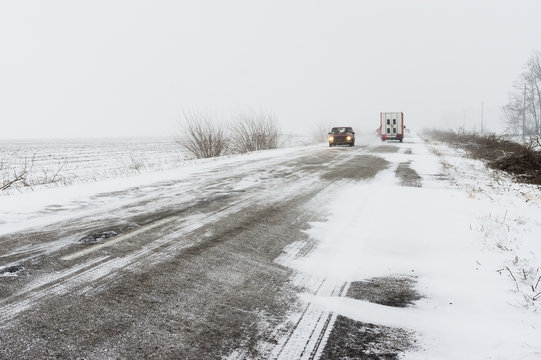 Winter landscape with highway and snow-drift in central Ukraine