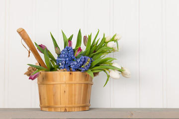 Sauna bucket with bouquet flowers