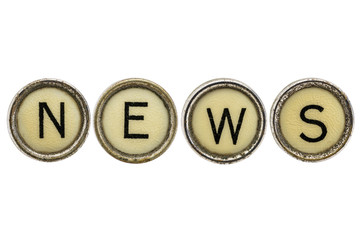 news word in typewriter keys