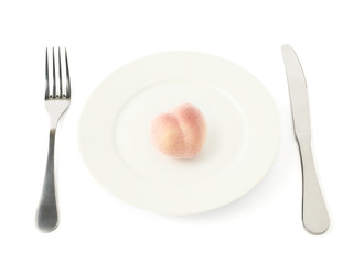 Peach fruit in a plate isolated