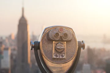 Selbstklebende Fototapeten Binocular with New York Skyscrapers on Background at Sunset © william87