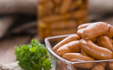 Small Sausages on wood