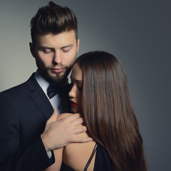 Sexy passion couple in love. Portrait of beautiful young man and