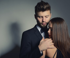 Sexy passion couple in love. Portrait of beautiful young man and