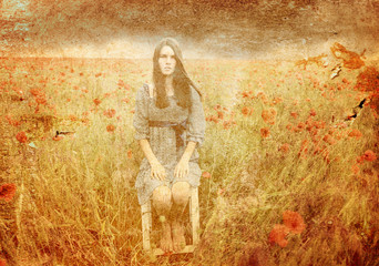 Mysterious portrait of young beautiful woman sitting on stool in