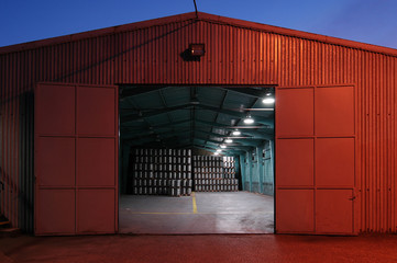 big brewery warehouse beer deposit in the night
