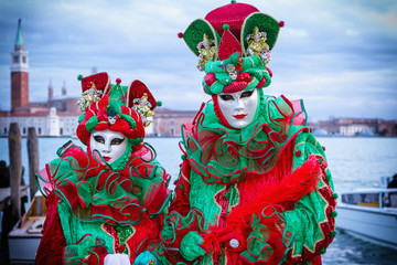 Fototapeta na wymiar Funny carneval mask in Venice - Venetian Costume
