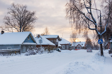 Winter landscape in northern Russian city in evening twilight