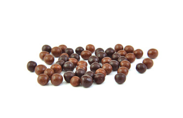 Chocolate balls on a white background.