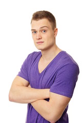 Obraz premium Young man in violet shirt in white background