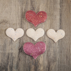 Fototapeta premium Hearts on the wooden