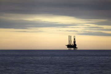 Gas platform at sunset