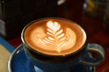 close up of cup of latte art coffee