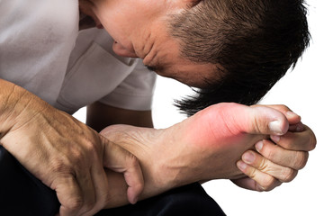 Man with painful and swollen right foot due to gout inflammation