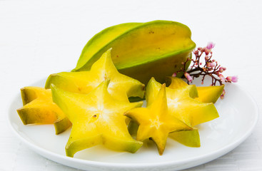 Starfruit on white mat