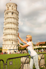Leaning tower of Pisa and Young Woman, Italy. - 76038659