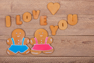 Gingerbread men and the words "I love you". Homemade cookies