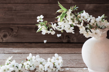 cherry flowers on grunge wooden background