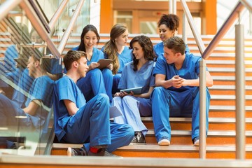 Medical students taking a break on the steps